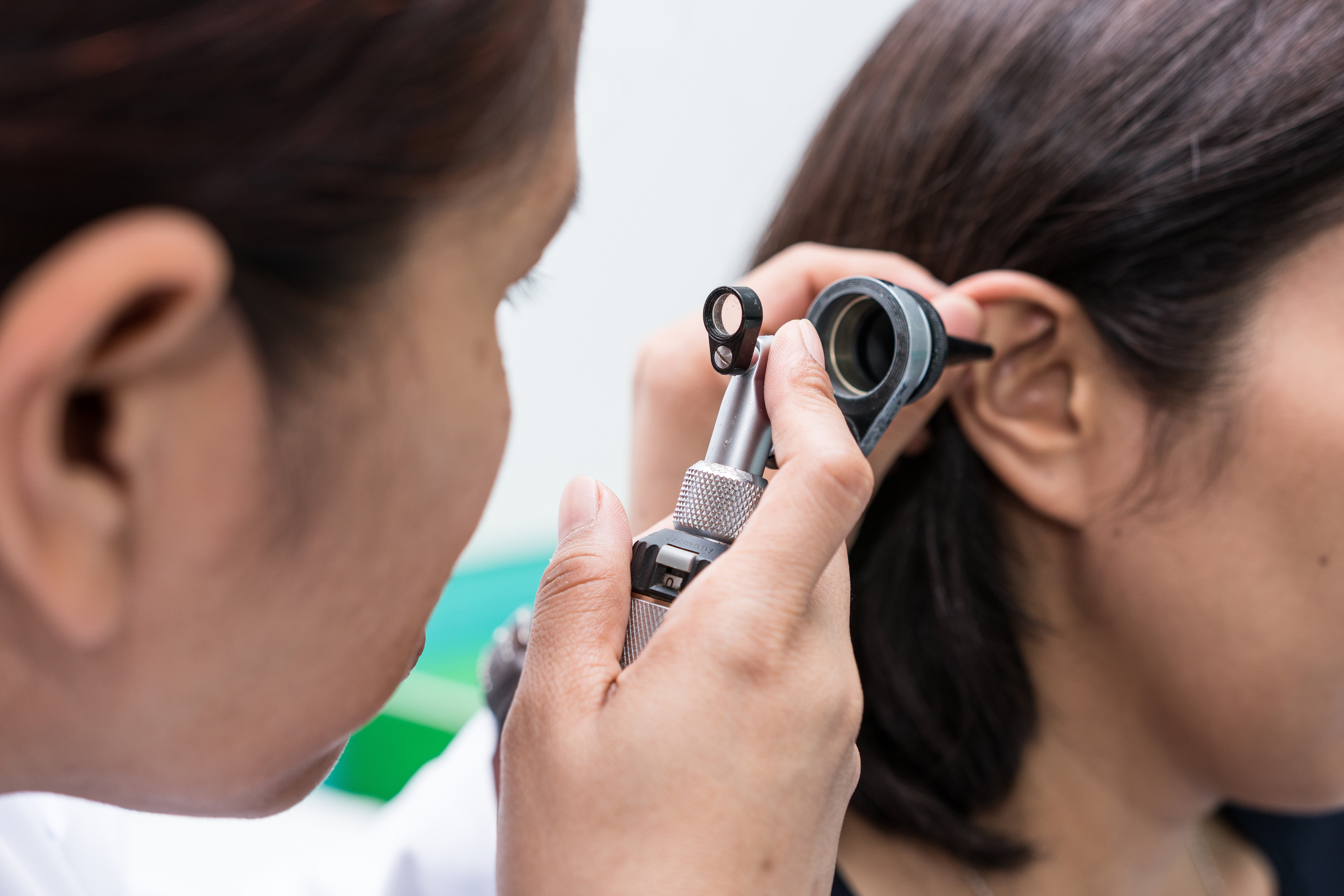 Image of Dr. Checking hearing